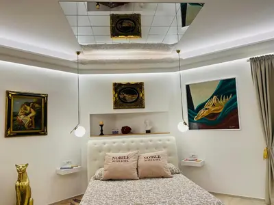 Letto o letti in una camera di NobileSuite