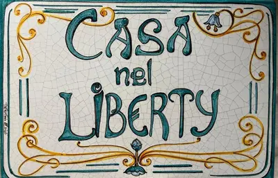Certificato, attestato, insegna o altro documento esposto da Casa nel Liberty