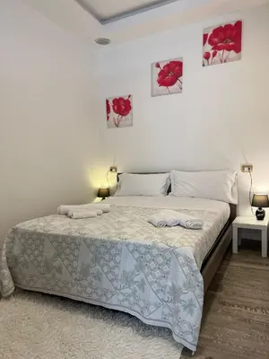 Letto o letti in una camera di la mia casa vacanze 