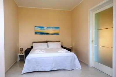 Letto o letti in una camera di Green Relax Arenella