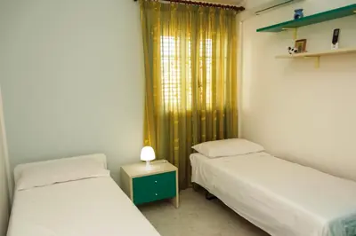 Letto o letti in una camera di Green Relax Arenella