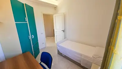 Letto o letti in una camera di Green Relax Arenella