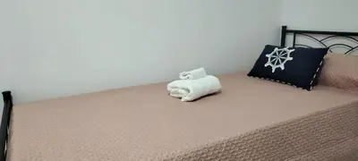 Letto o letti in una camera di Perla marina