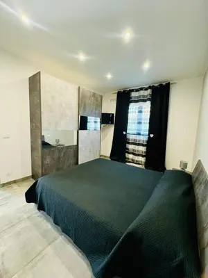 Letto o letti in una camera di Casa Gavedi at 150 meters about from the beach