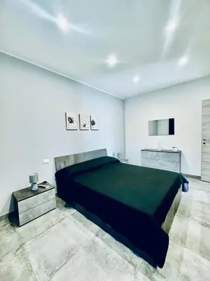 Letto o letti in una camera di Casa Gavedi at 150 meters about from the beach