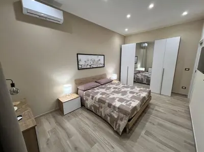 Letto o letti in una camera di La Dimora Etnea