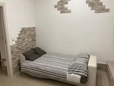 Letto o letti in una camera di Bloom House