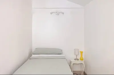 Letto o letti in una camera di Terranova House 19