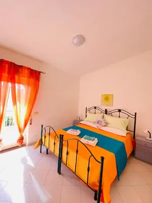 Letto o letti in una camera di Appartamento Fronte Mare Marzamemi