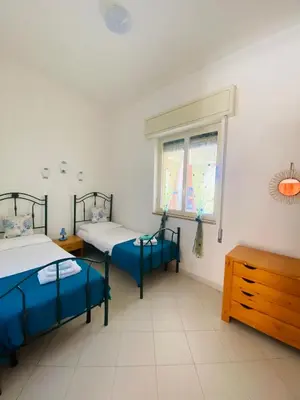 Letto o letti in una camera di Appartamento Fronte Mare Marzamemi