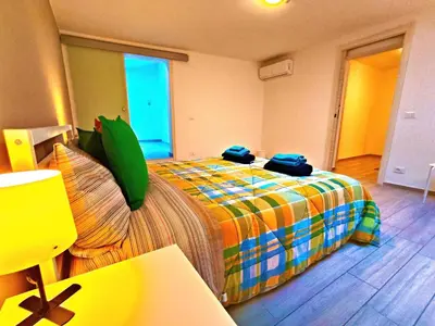 Letto o letti in una camera di Attico con terrazzo al centro storico di Catania
