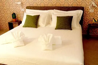 Letto o letti in una camera di L'Aura d'Ortigia Suite