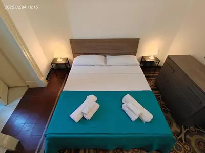 Letto o letti in una camera di Giulio's Apartment