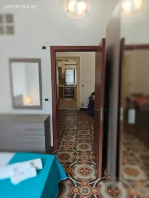 Letto o letti in una camera di Giulio's Apartment