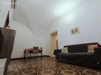 Area soggiorno di Giulio's Apartment