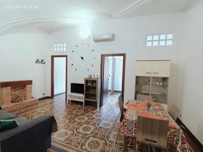 Area soggiorno di Giulio's Apartment