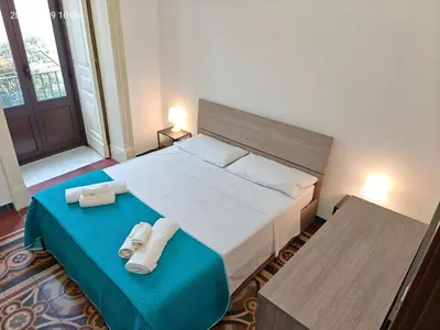 Letto o letti in una camera di Giulio's Apartment