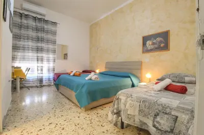 Letto o letti in una camera di CATANIA AIRPORT ROOM BAGNO PRIVATO iN CAMERA