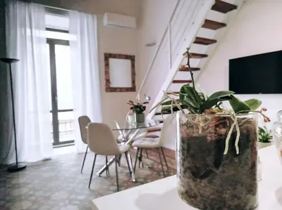 TV o dispositivi per l'intrattenimento presso Living Suite Catania Garibaldi