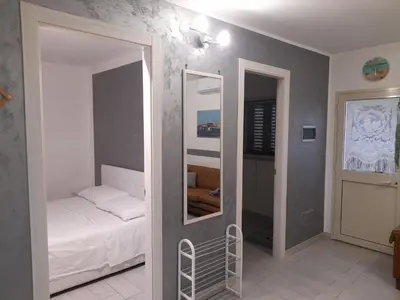 Letto o letti in una camera di villa Porto fossa