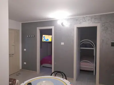 Letto o letti in una camera di villa Porto fossa