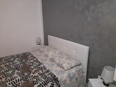 Letto o letti in una camera di villa Porto fossa