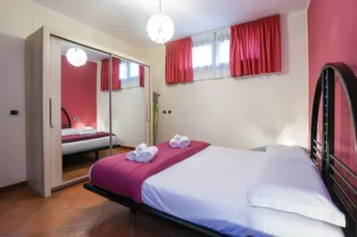 Letto o letti in una camera di Villa Melina
