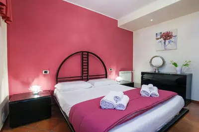 Letto o letti in una camera di Villa Melina