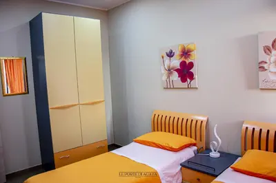 Letto o letti in una camera di Loft appartamento Privato esclusivo residenziale , Parcheggio gratuito , Catania