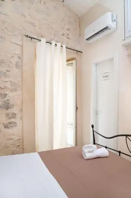 Letto o letti in una camera di Casuzze SPA