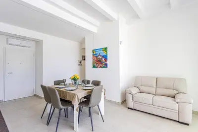Area soggiorno di Villa Andromeda by Villa Plus