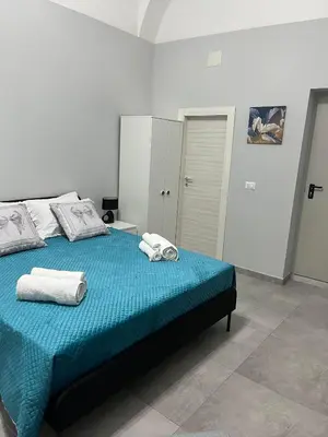 Letto o letti in una camera di casa vacanza I 4 diamanti room 2