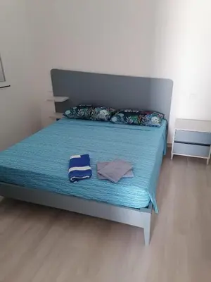 Letto o letti in una camera di Casa Diletta