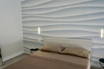 Letto o letti in una camera di Vico Ventitré 2