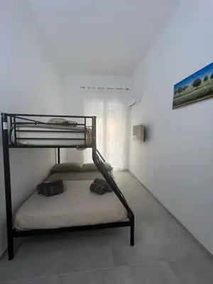 Letto o letti in una camera di Vico Ventitrè 1
