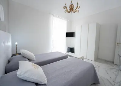 Letto o letti in una camera di SWEET HOME DELUXe