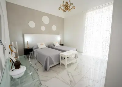 Letto o letti in una camera di SWEET HOME DELUXe