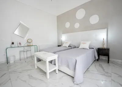 Letto o letti in una camera di SWEET HOME DELUXe
