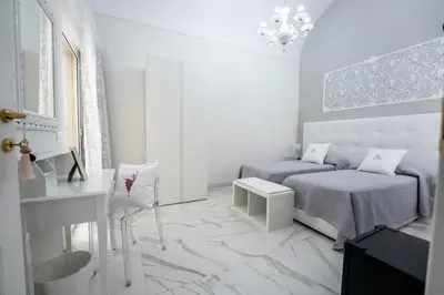 Letto o letti in una camera di SWEET HOME DELUXe