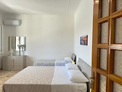 Letto o letti in una camera di Villa Sole near the sandy beach, parking & wifi