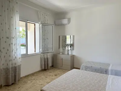 Letto o letti in una camera di Villa Sole near the sandy beach, parking & wifi