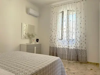 Letto o letti in una camera di Villa Sole near the sandy beach, parking & wifi