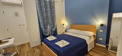 Letto o letti in una camera di CentroCittà Twin