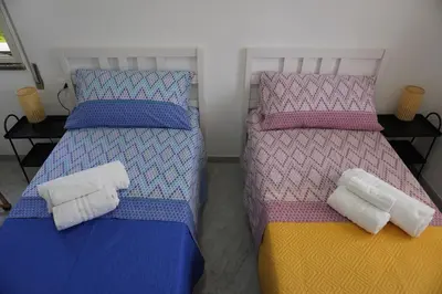 Letto o letti in una camera di Monsant Casa Vacanze