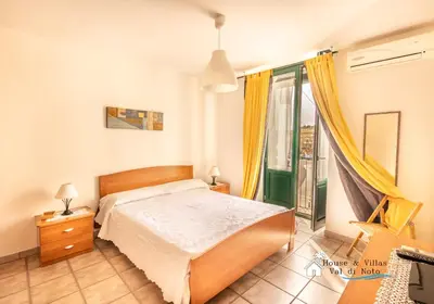 Letto o letti in una camera di AKRAI