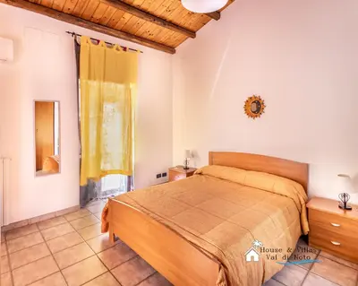Letto o letti in una camera di AKRAI