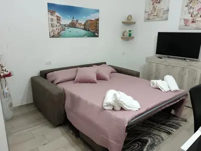 Letto o letti in una camera di Tempio di Apollo