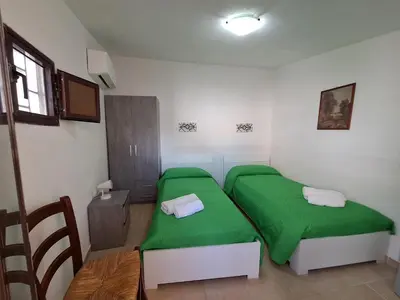 Letto o letti in una camera di La Casa della nonna Lucia
