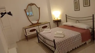 Letto o letti in una camera di casa del corso