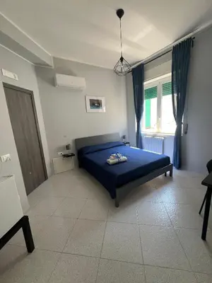 Letto o letti in una camera di Settetrequattro Rooms